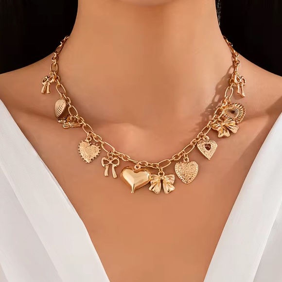 Gold Charm Necklace – Heart, Clock, Bow & More – Mainstream  Maison Gold Heart & Bow Charm Necklace